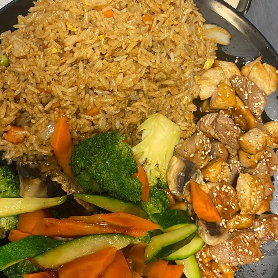 Yama Fuji's hibachi chicken and steak with fried rice and mixed vegetables.